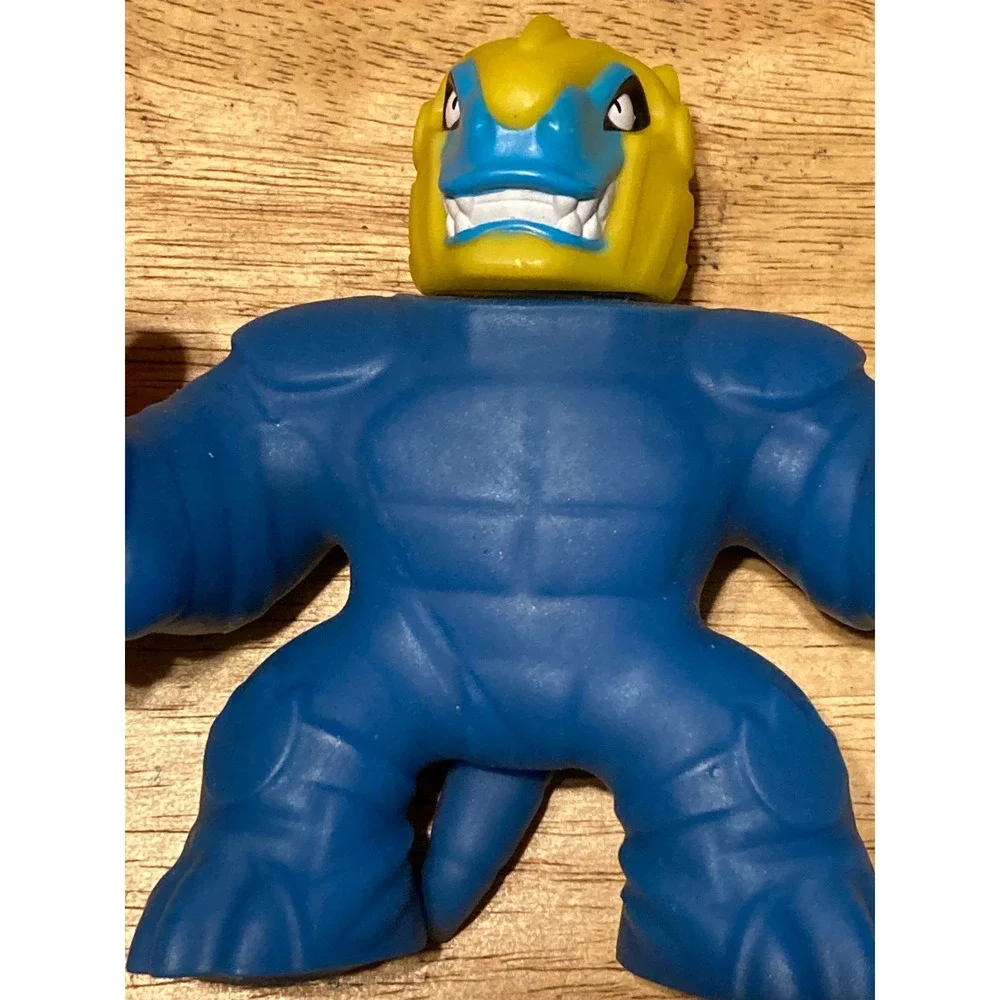 Heroes of Goo Jit Zu Dino Power Blue Squishy Figure with Red Blaster Accessory